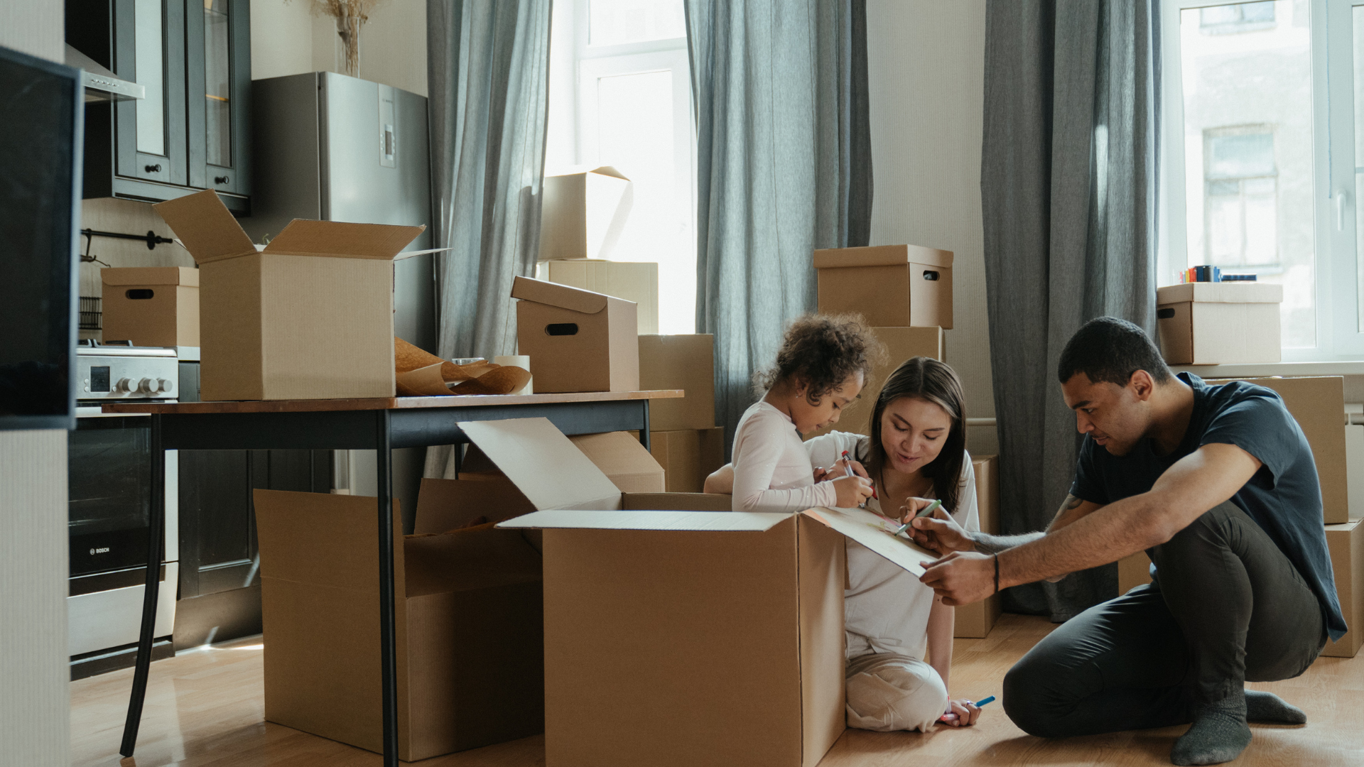 A family packing stuff and ready for a move