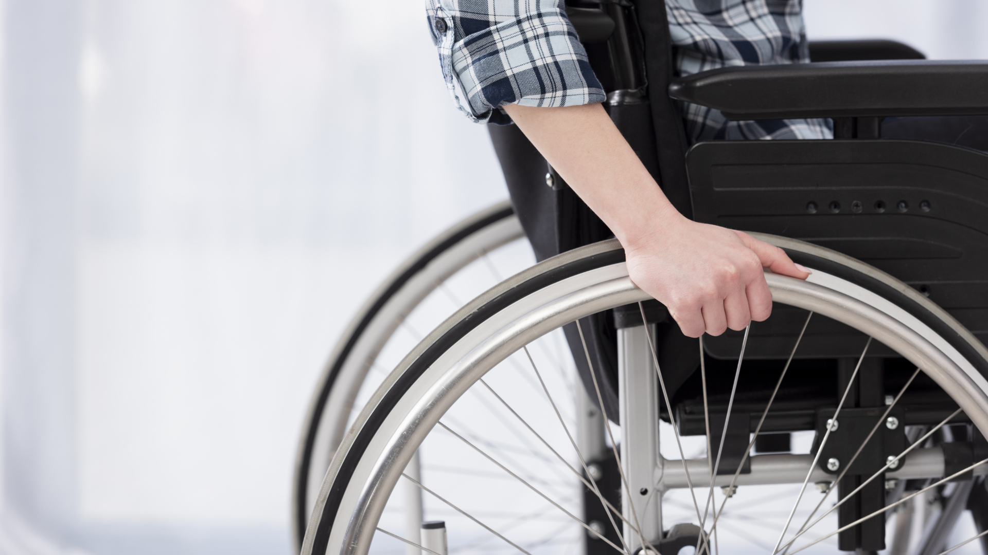 Close up picture of person with in a wheelchair