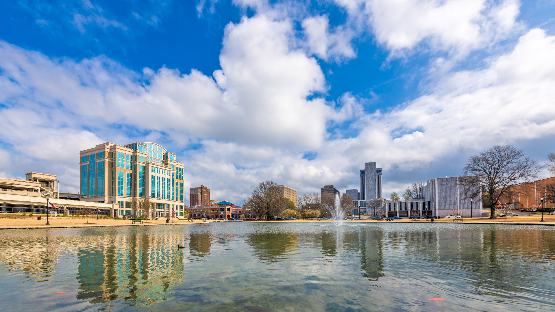 Huntsville, Alabama, USA park and downtown cityscape.