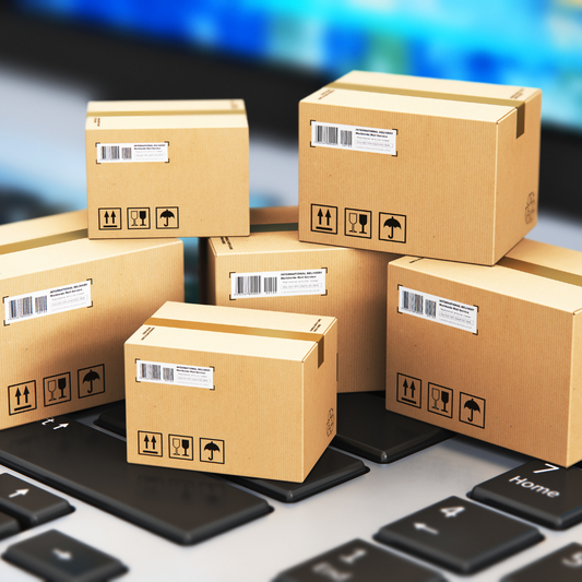 alt="six boxes at the top of laptop keyboard"